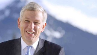 Headshot of a smiling Dominic Barton.